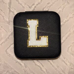 Black Case with Gold and White Letter L